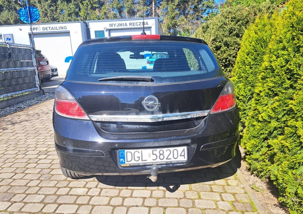 Opel Astra cena 8000 przebieg: 322534, rok produkcji 2009 z Szczecin małe 56